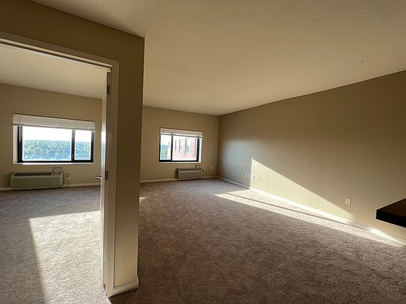 living room with dining area and bedroom