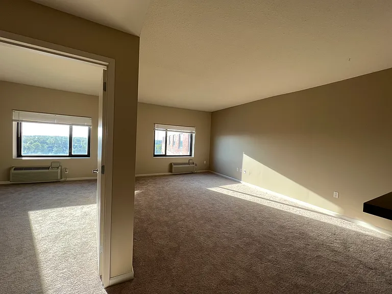 living room with dining area and bedroom