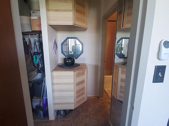Plenty of closet space, and extra storage in this custom built cabinetry.