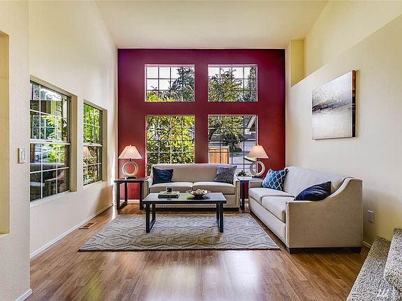 You'll be impressed by the spacious main floor. Soaring ceilings and walls of windows make the space light and bright.
