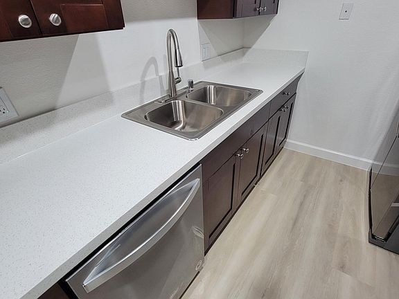 brand new stainless steal dishwasher and sink with pull down faucet