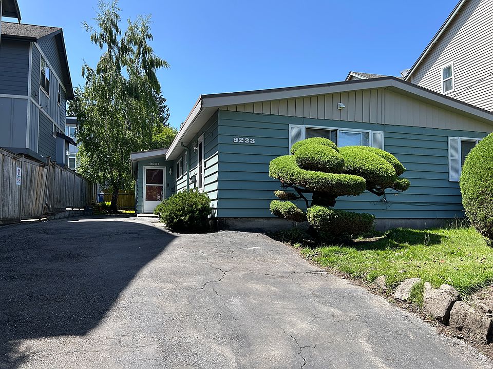 Front of the house with plenty of parking spaces.