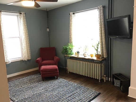 Living room with abundant lighting from windows