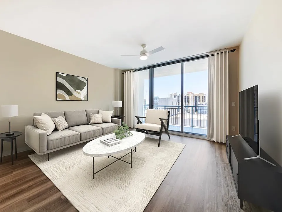 Tower Building - Renovated II living room with hard surface flooring