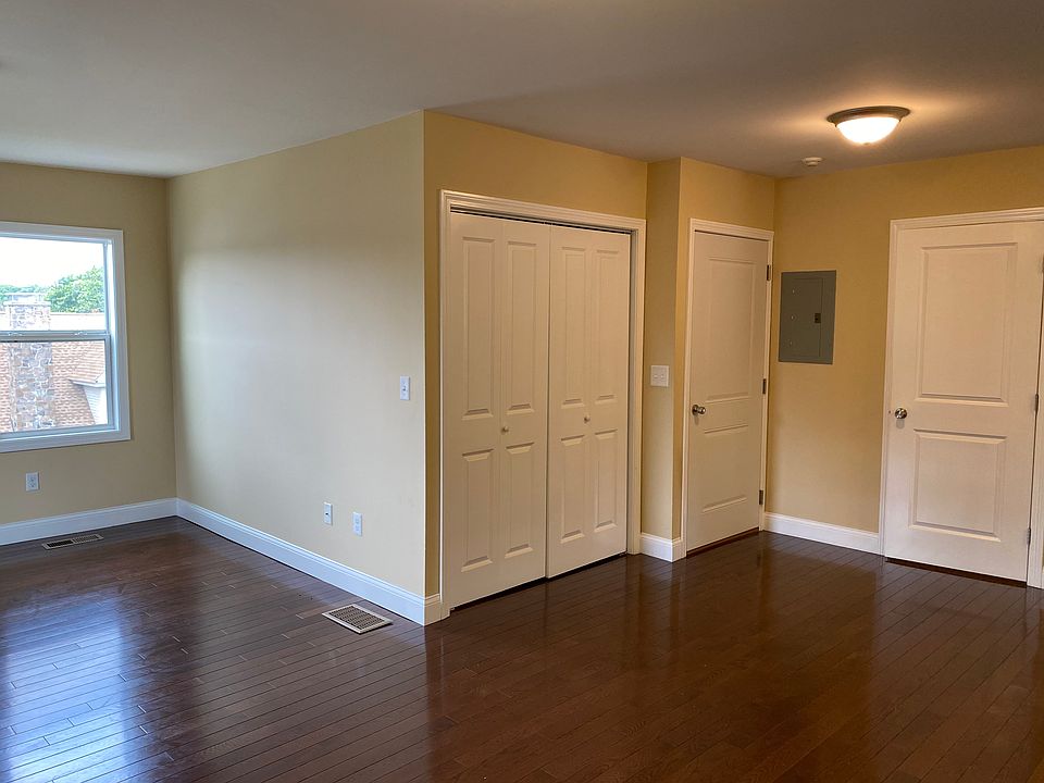 View of back entry & closets from dining area
