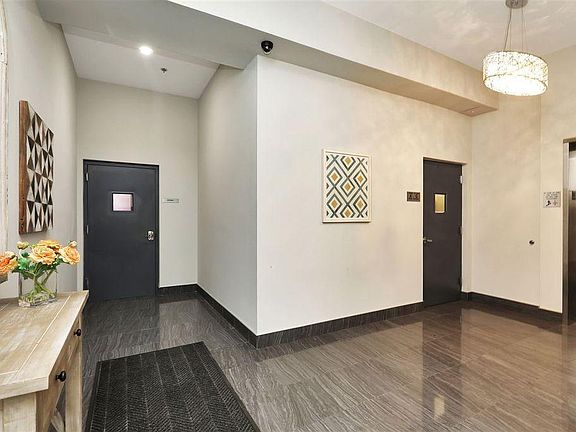 5th image of 554 55th St APT 402
