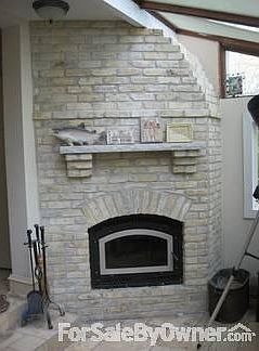 Natural Fireplace : CIS high effic. nat. fireplace with unique, local Milwaukee Cream City brick.