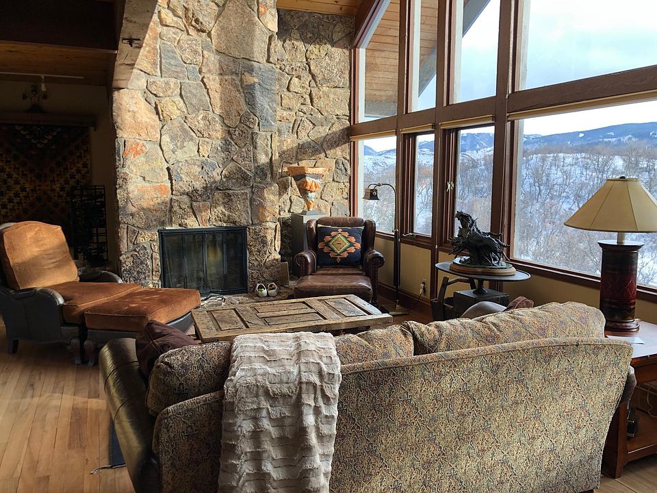 Living room with wood burning fireplace