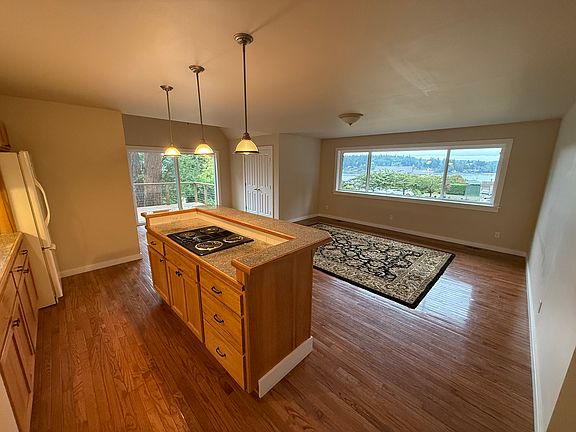 Kitchen Dining Living with views of the harbor