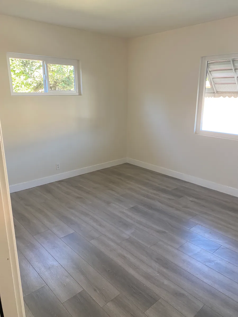 Bedroom - brand new flooring and windows - 9947 1/2 E Garibaldi Ave