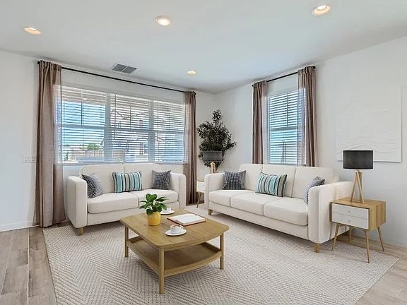 Great Room. Punch list items being completed & reason for stock community website photos