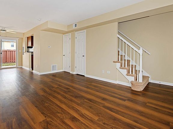 Living room opens to a private patio