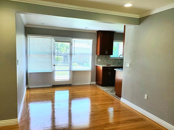 From the living room you will see the dining room area-view to the backyard