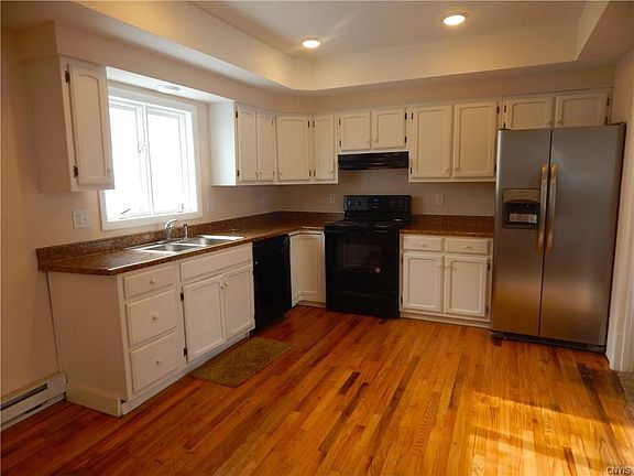 Updated Kitchen with refinished hardwood floor and new appliances