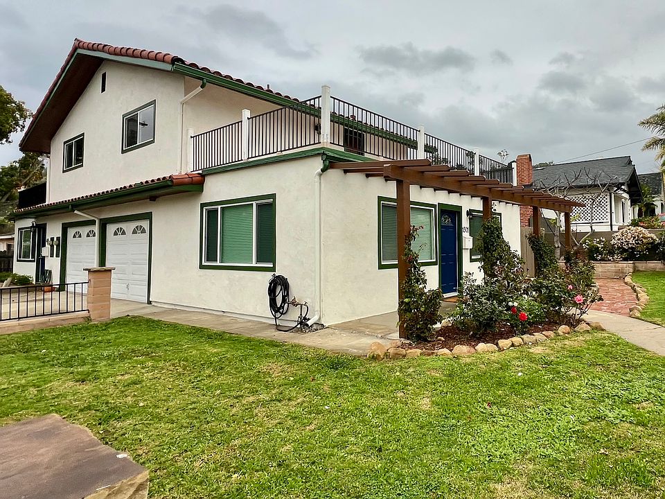 Front of Gutierrez with deck and garages. Looking north from Gutierrez