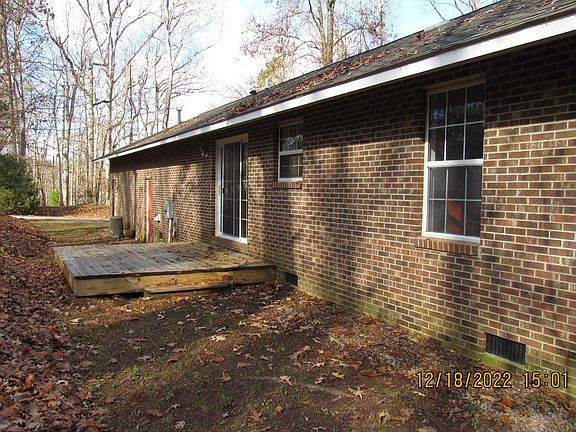 Wooden patio just steps away from the dining area. Great for summer cookouts.