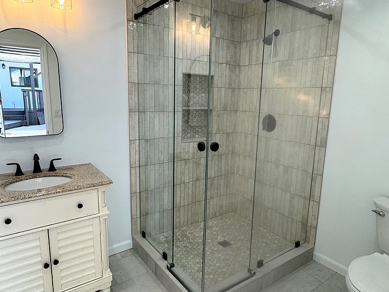 Detached garage with a full bathroom.