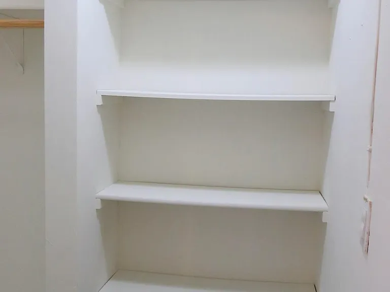 Extra shelves in walk in closet.