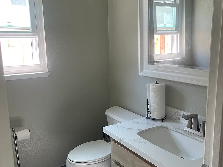 Half bathroom located downstairs