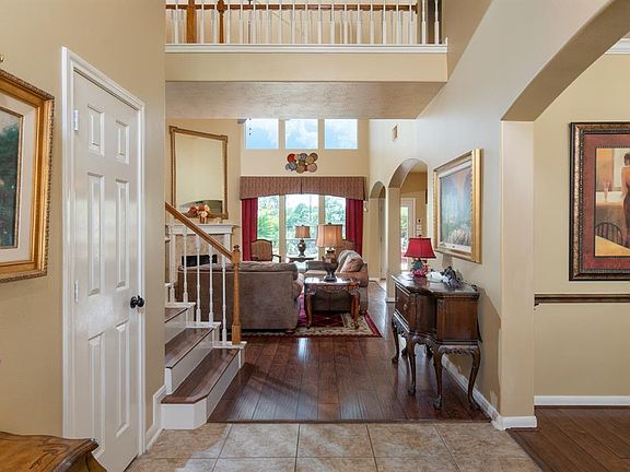 Open sight lines lead you straight to the family room and offers views of the tropical oasis in the backyard!