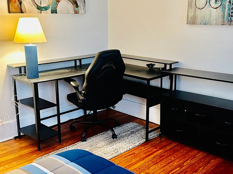 Office area in the blue room ideal for remote workers or students.