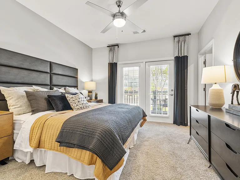 Langley Pointe Apartments | Bedrooms w/ Patio Access