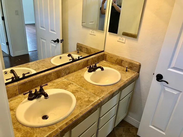 Guest bathroom with dual sinks