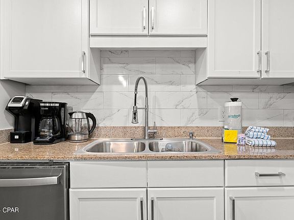 4th image of 9860 S Thomas Dr Unit 207