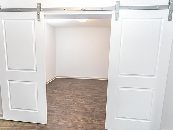 Main level den with barn doors