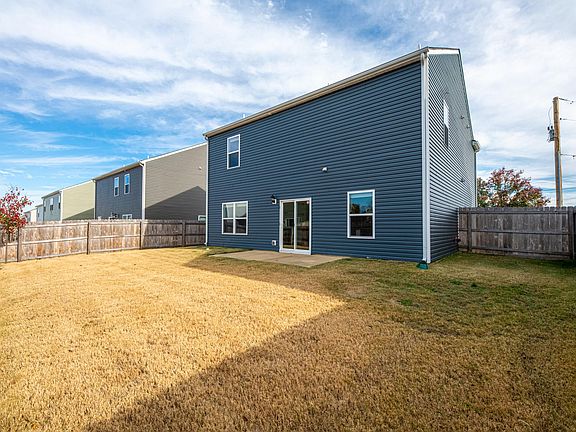 Nice-sized, fully-fenced backyard. Easy to maintain!