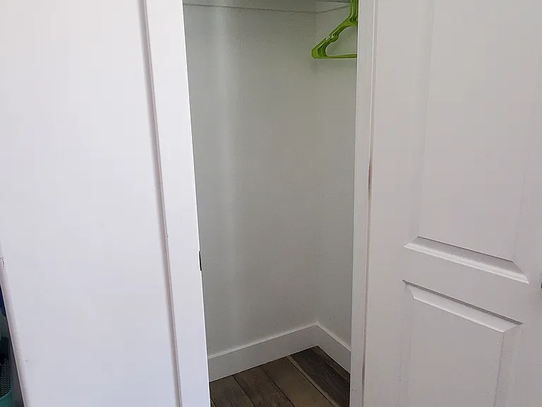 Ample storage space in the master suite walk-in closet. A clean and efficient area to keep your private space clutter-free.