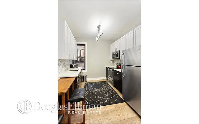 Sold by Douglas Elliman | media 11