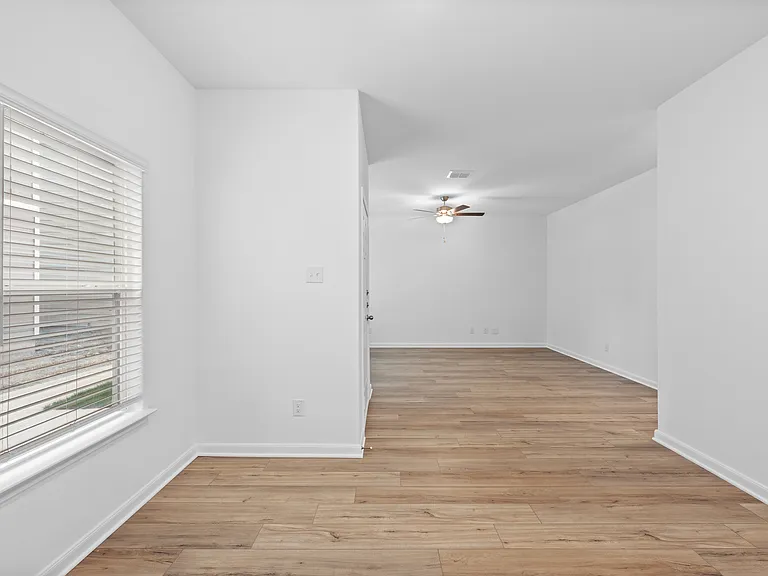 The dining room leads to the family room.