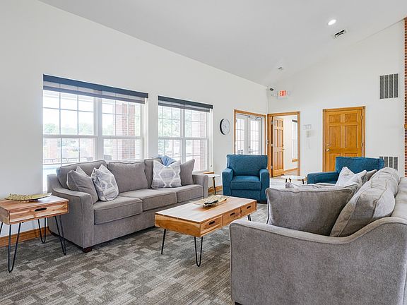 Kick back, relax, and watch some TV in our clubhouse at Williamsburg Park