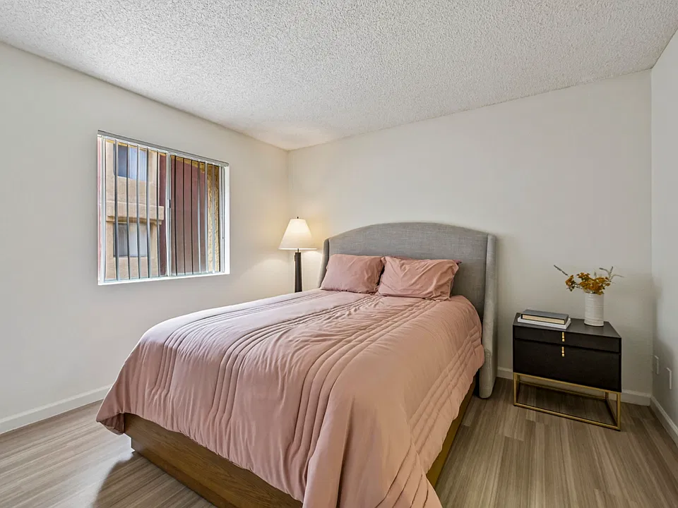 A restful bedroom with natural light.