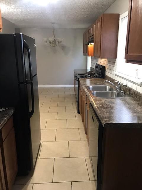 1st image of 6046 E 39th St