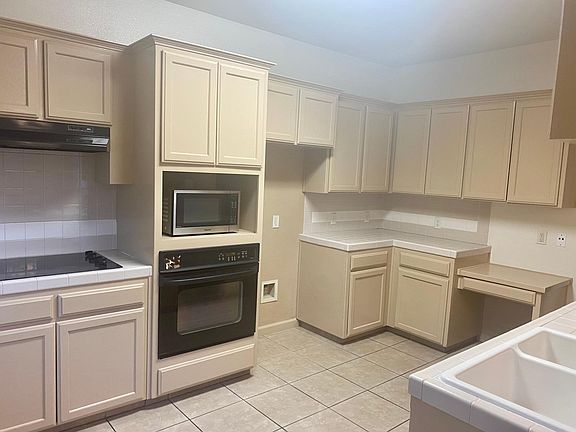 5th image of 9836 N Ann Ave