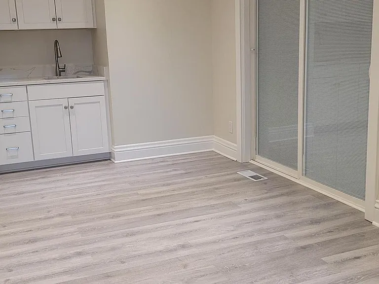 Wet-Bar w/sink & 6' sliding Patio door from the 13' x 13' Dining area to the private 5' x 16' side deck
