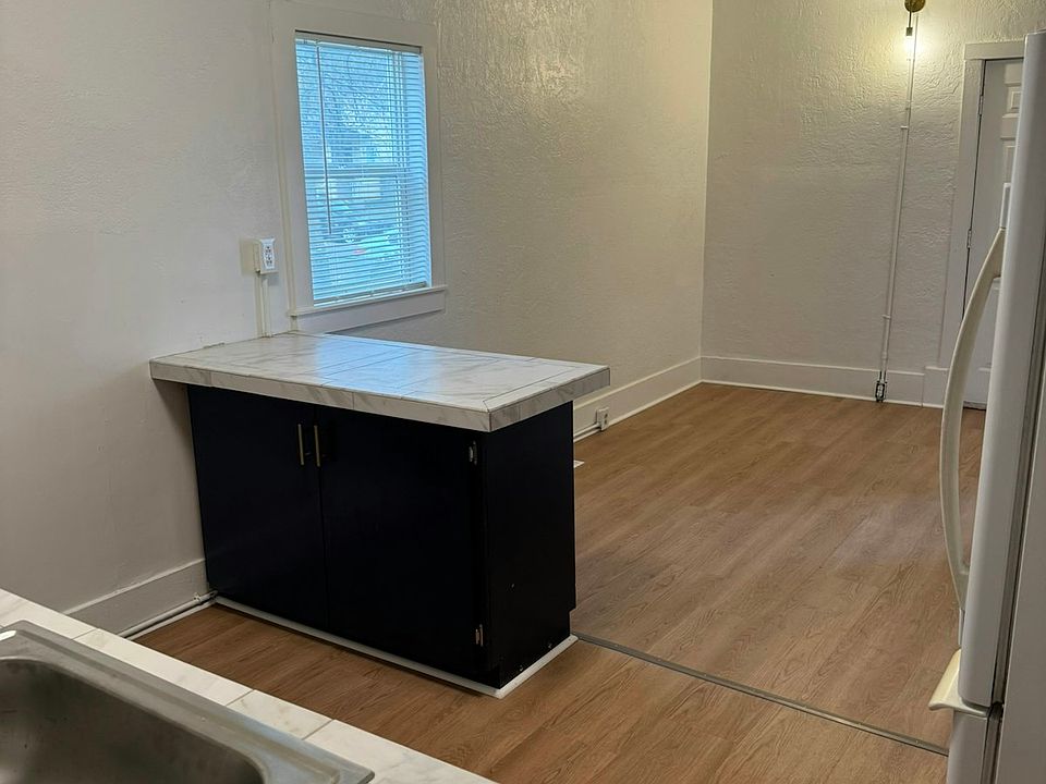 Kitchen looking at living room