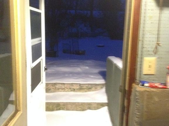 Looking out the backdoor into the backyard