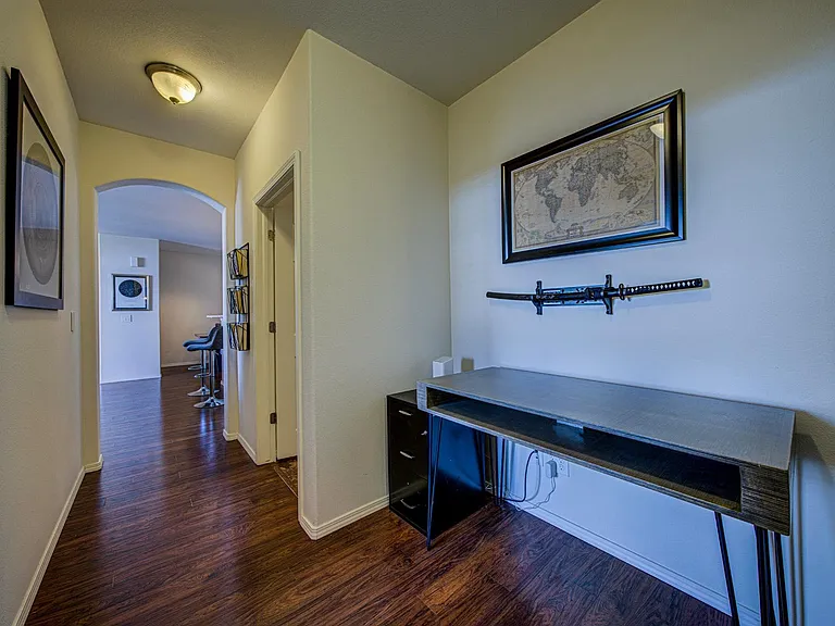 Desk area around the corner from the kitchen.