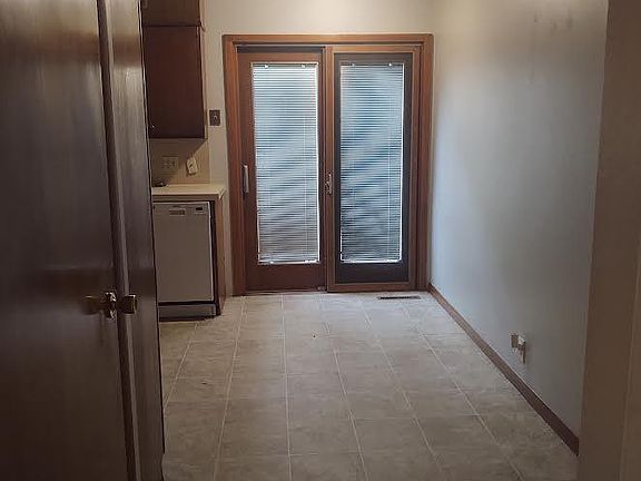 Doors off kitchen out to deck