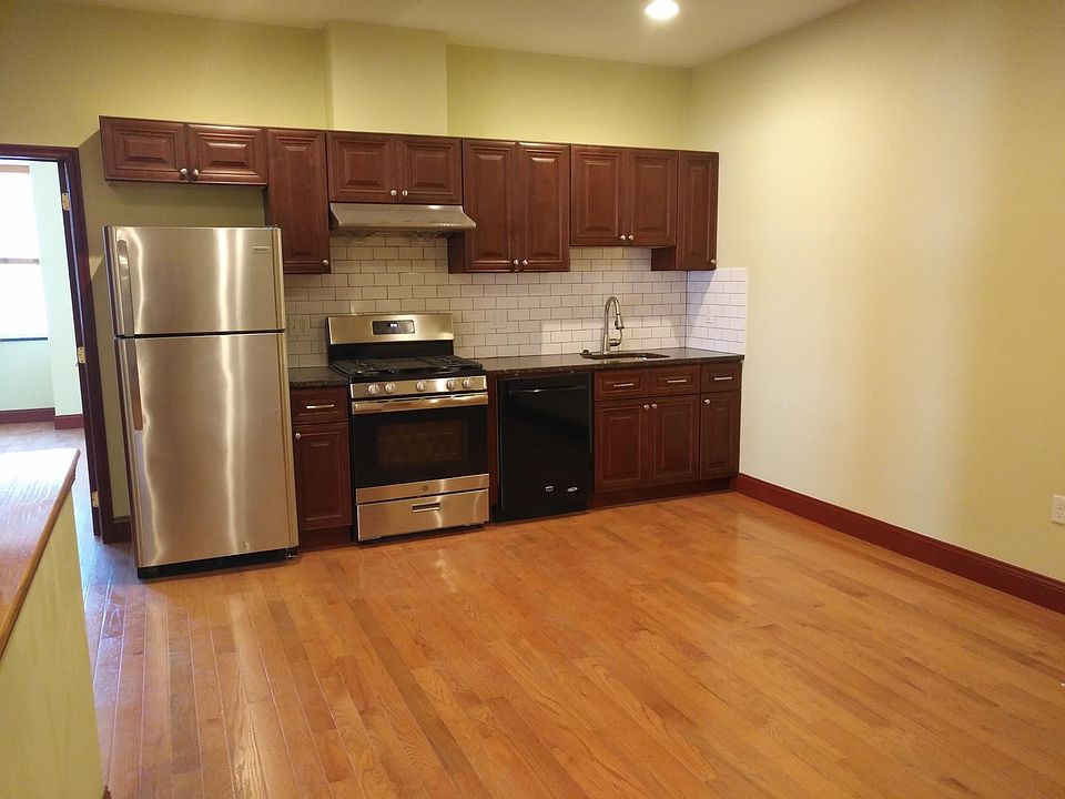 Kitchen and living space angle 1