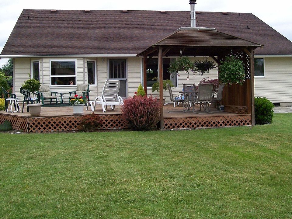 Rear view of house and deck