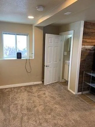 bedroom area door to bath