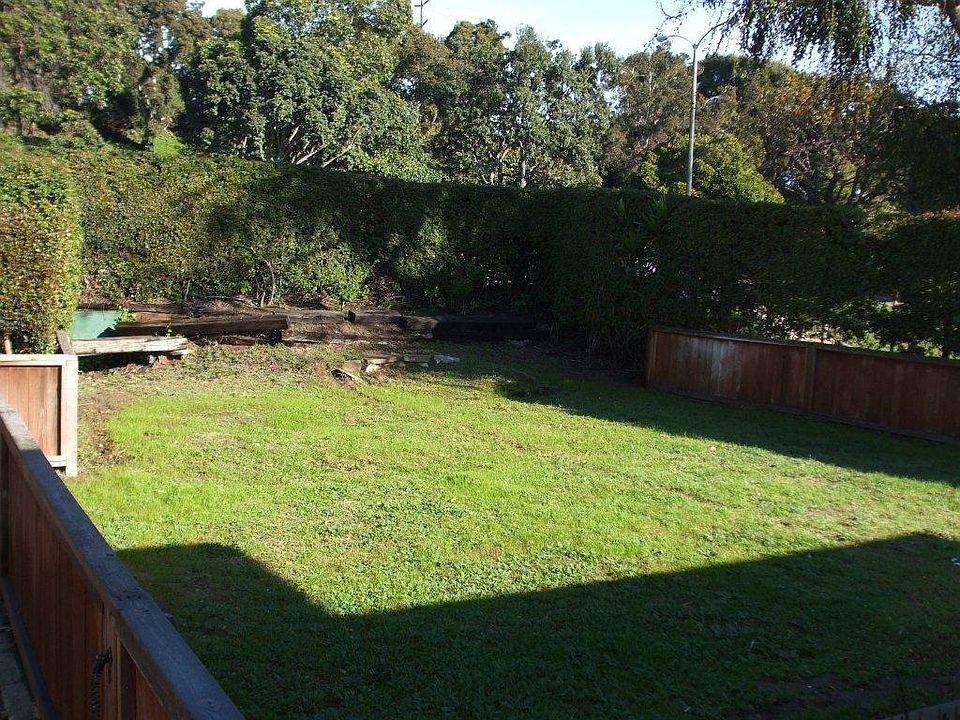 Giant Enclosed Grassy Front Yard