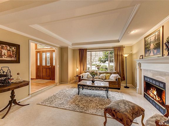 Living room with large window looking at to your front garden.