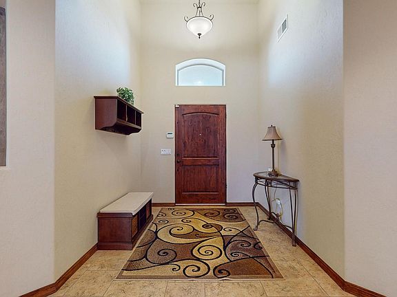 3rd image of 9701 Big Sage Dr NW