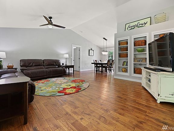 Open living floor plan. Hardwood hand-scraped oak floors throughout. 