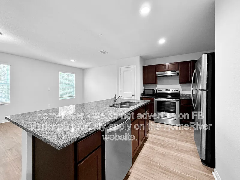 Building Photo - 7650 Mailes Ct #101